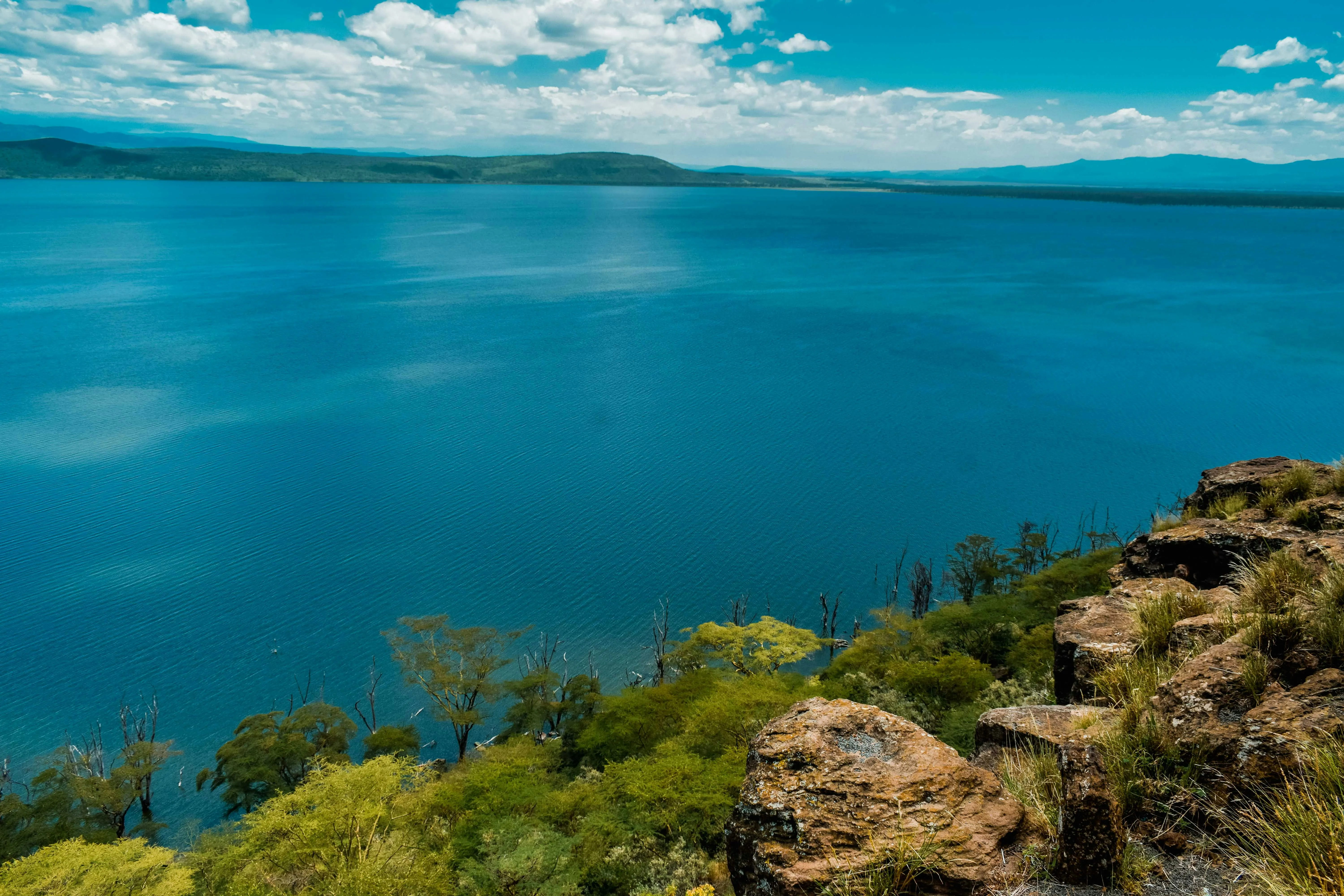 The open water of the lake under a clear Rift Valley sky.